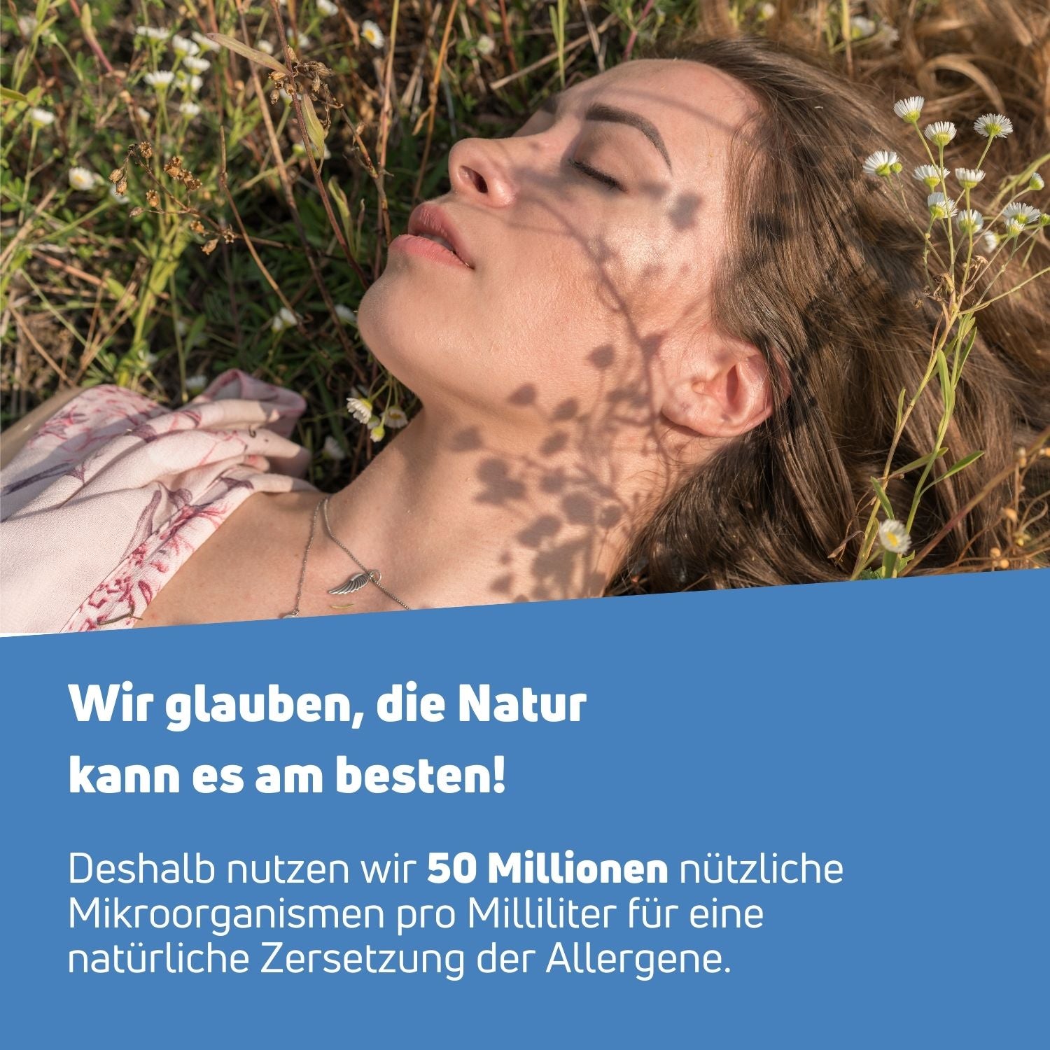 Frau mit Blumen im Haar, die an nachhaltigen mikrobiologischen Lösungen für Allergene glaubt.