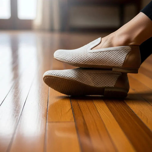 Stylish breathable shoes on feet, emphasizing comfort and hygiene in foot care